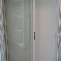 PORTE COULISSANTE ECO 2 VANTAUX 2 PISTES BLANC